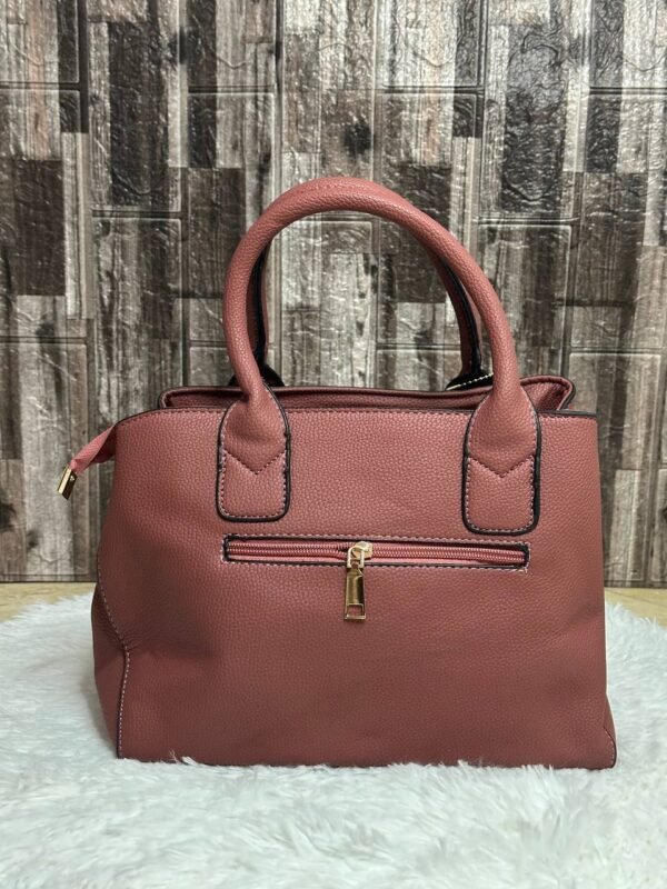 Women’s Pink Handbag with Bow and Gold Charm